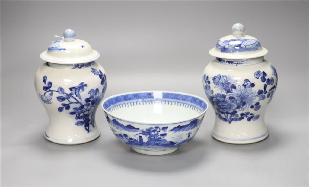 A pair of 19th century Chinese blue and white jars, 21cm high including lids and covers and a similar blue and white bowl